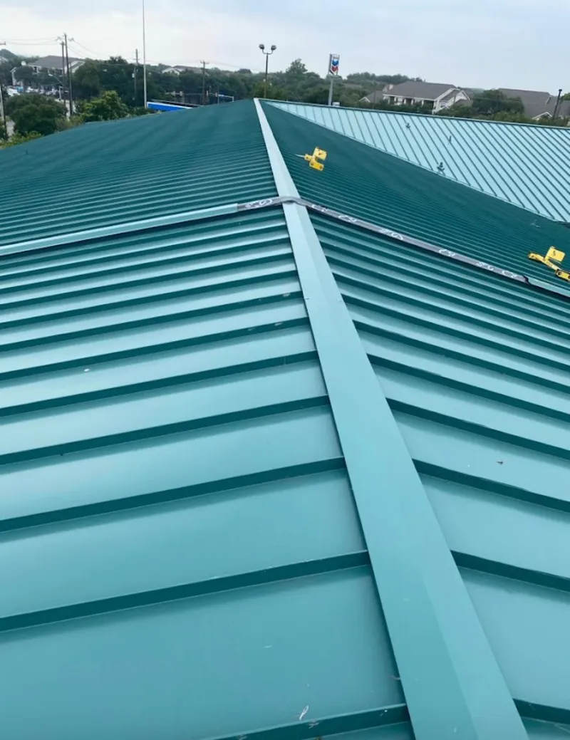 Green commercial metal roof ridge and valley for Metal Roof Repair in Larchmont