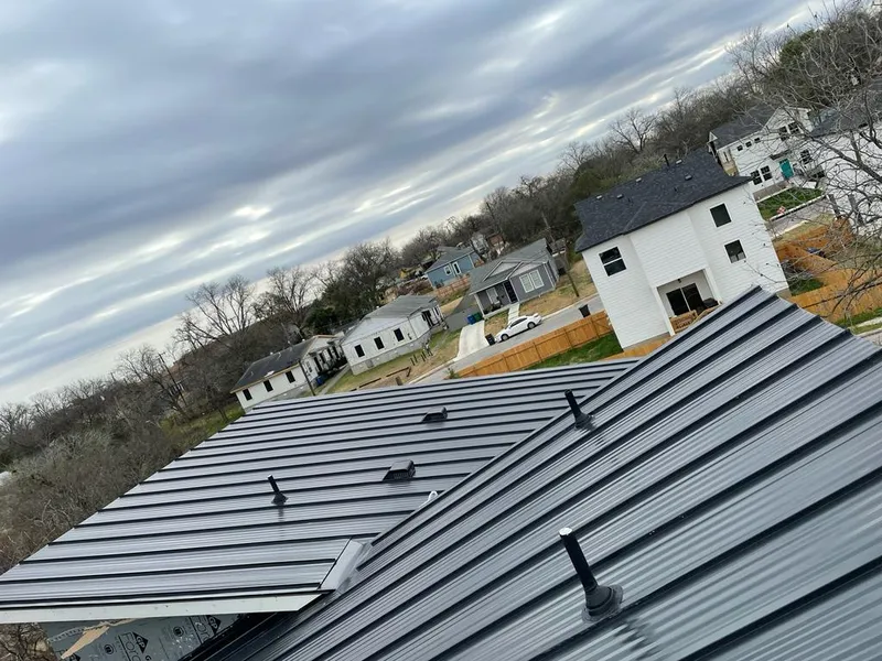 Standing seam metal roof panels with vents for Skylight Repair in Larchmont